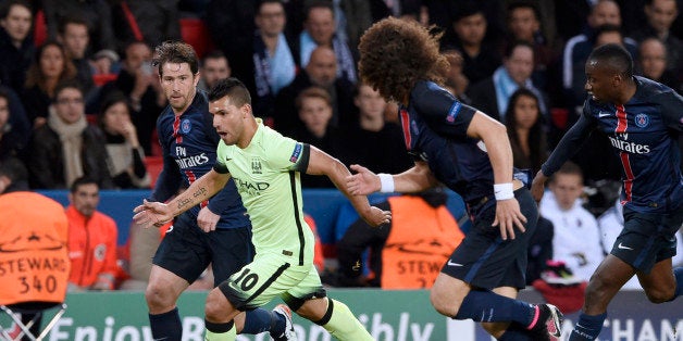 Manchester City's Argentinian striker Sergio Aguero vies with Paris Saint-Germain's Brazilian defender Maxwell (L) and Paris Saint-Germain's Brazilian defender David Luiz during the UEFA Champions League quarter final football match between Paris Saint Germain (PSG) and Manchester City on April 6, 2016 at the Parc des Princes stadium in Paris. / AFP / MIGUEL MEDINA (Photo credit should read MIGUEL MEDINA/AFP/Getty Images)