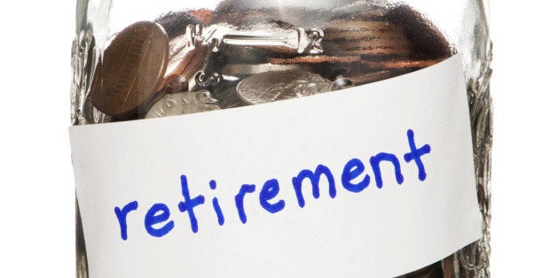 Jar of Coins Labeled Retirement on White