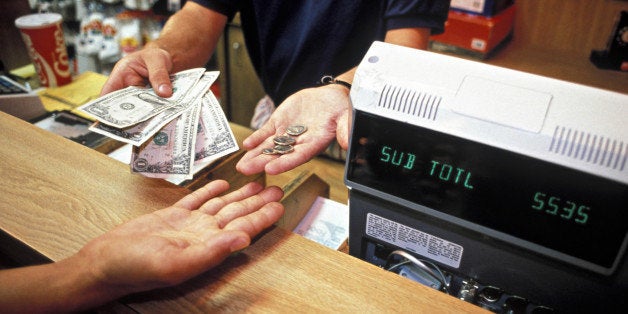 RETAIL CLERK GIVES CHANGE TO CUSTOMER. CASH REGISTER SEEN. PARAMUS, NEW JERSEY. (*) H