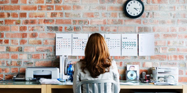 Businesswoman Working at Her Desk