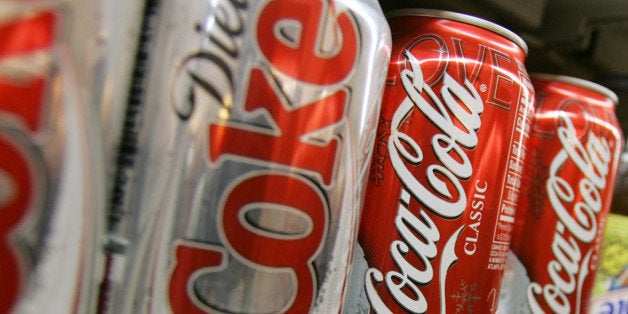 UNITED STATES - DECEMBER 07: Coca-Cola Classic and Diet Coke cans are on display at a supermarket in New York on Wednesday, December 07, 2005. PepsiCo Inc., the world's second-largest soft-drink maker, may surpass Coca-Cola Co. in market value for the first time after beating its competitor in sales growth and diversifying beyond soda. (Photo by Daniel Barry/Bloomberg via Getty Images)