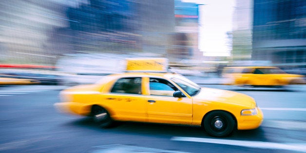 New York Yellow Taxi heading uptown.