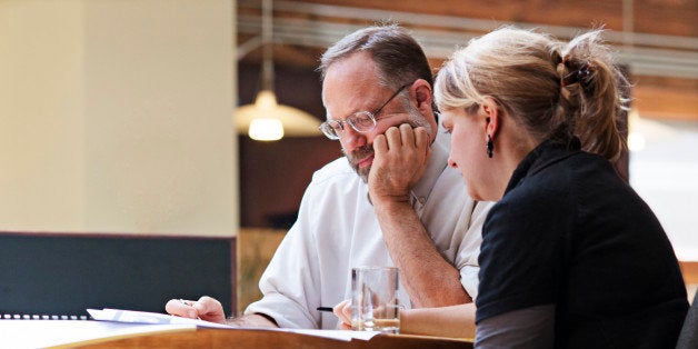 Coworkers in small meeting