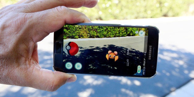 The augmented reality mobile game "Pokemon Go" by Nintendo is shown on a smartphone screen in this photo illustration taken i