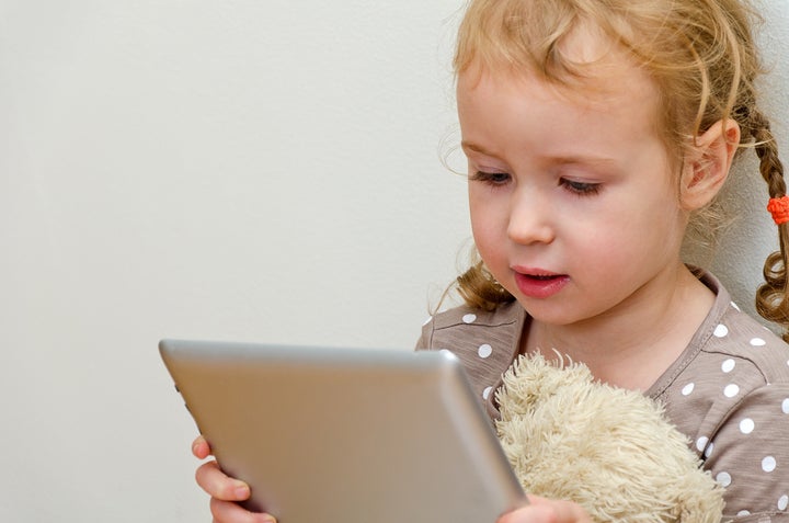 cute little girl sitting...