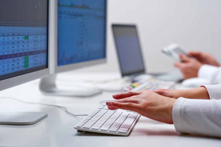 Female hands using keyboard