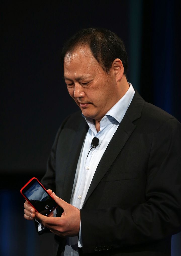 MENLO PARK, CA - APRIL 04: HTC CEO Peter Chou holds the new HTC First phone during an event at Facebook headquarters during an event at Facebook headquarters on April 4, 2013 in Menlo Park, California. Facebook CEO Mark Zuckerberg announced a new product for Android called Facebook Home as well as the new HTC First phone that will feature the new software. (Photo by Justin Sullivan/Getty Images)