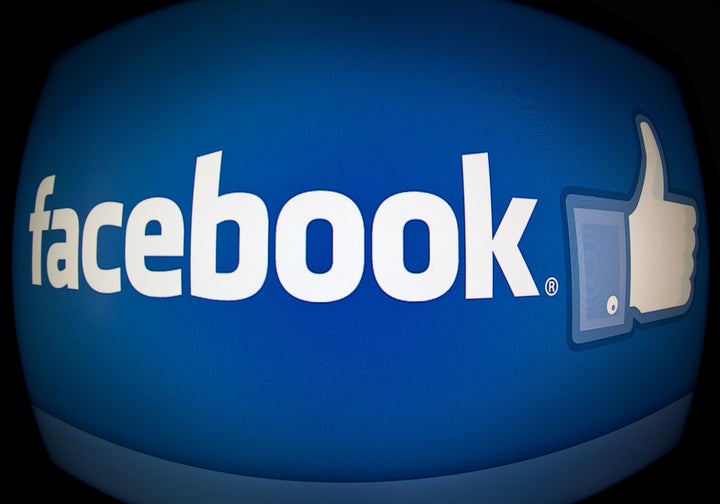 (FILES)This February 25, 2013 photo taken in Washington, DC, shows the splash page for the Internet social media giant Facebo