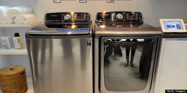 LAS VEGAS, NV - JANUARY 08: Samsung's Smart Care washer and dryer are on display at the 2013 International CES at the Las Vegas Convention Center on January 8, 2013 in Las Vegas, Nevada. CES, the world's largest annual consumer technology trade show, runs through January 11 and is expected to feature 3,100 exhibitors showing off their latest products and services to about 150,000 attendees. (Photo by David Becker/Getty Images)