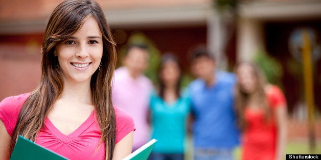 female student carrying...