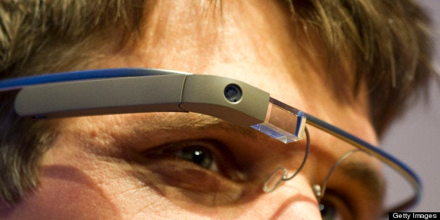 A visitor of the 'NEXT Berlin' conference tries out the Google Glass on April 24, 2013 in Berlin. 'NEXT Berlin' describes its