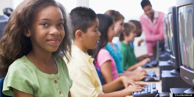 female pupil in school computer ...