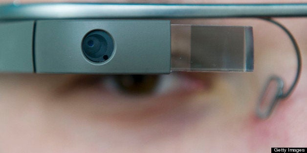 A visitor of the 'NEXT Berlin' conference tries out the Google Glass on April 24, 2013 in Berlin. 'NEXT Berlin' describes its