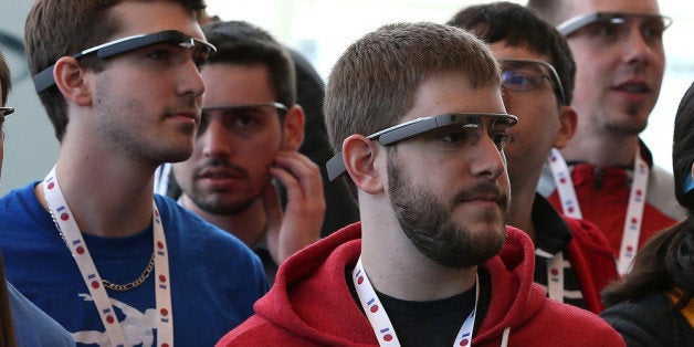 SAN FRANCISCO, CA - MAY 17: Attendees wear Google Glass while posing for a group photo during the Google I/O developer confe
