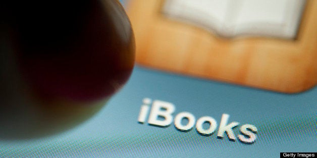 A digital book is displayed on an Apple Inc. iPad for a photograph in New York, U.S., on Wednesday, April 11, 2012. Apple Inc. and two publishers, Macmillan and Penguin, were accused by the U.S. Justice Department of conspiring to fix prices of digital books to undermine Amazon.com Inc.'s dominance of the industry. Photographer: Scott Eells/Bloomberg via Getty Images