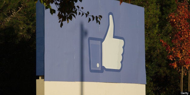 The Facebook Inc. thumbs-up 'Like' icon is displayed on a sign at the company's new campus in Menlo Park, California, U.S., on Friday, Dec. 2, 2011. Facebook hopes to accommodate over 6,000 employees on the new campus, which will spread out over a million square feet of office space when completed in mid-December 2011. Photographer: David Paul Morris/Bloomberg via Getty Images