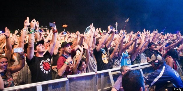 INDIO, CA - APRIL 21: Wu Tang Clan fans at 2013 Coachella Music Festival on April 21, 2013 in Indio, California. (Photo by He
