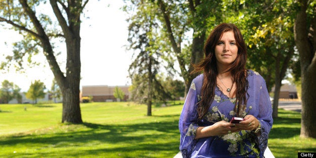 29-year-old Allison Silva uses the phone app HowAboutWe to meet people for dating. She was at an Aurora Park on Thursday, September 22, 2011. Cyrus McCrimmon, The Denver Post (Photo By Cyrus McCrimmon/The Denver Post via Getty Images)