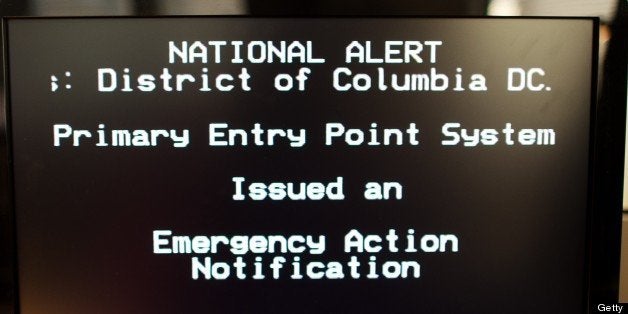 The new Emergency Alert System(EAS) test is viewed on a television screen on November 9, 2011 in Washington, DC. The FCC and the Federal Emergency Management Agency, FEMA, conducted the first-ever nationwide test of the national Emergency Alert System. EAS participants broadcast alerts and warnings regarding severe weather alerts, child abductions and other types of emergencies. The EAS alerts are transmitted over radio and television broadcast stations, cable television and other media services. AFP Photo/Paul J. Richards (Photo credit should read PAUL J. RICHARDS/AFP/Getty Images)