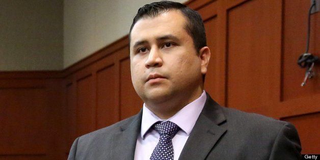 George Zimmerman listens as the jury finds him not guilty on the 25th day of his trial at the Seminole County Criminal Justice Center in Sanford, Florida, Saturday, July 13, 2013. Zimmerman has been charged with second-degree murder in the fatal shooting of Trayvon Martin, an unarmed teen, in 2012. (Pool/Joe Burbank/Orlando Sentinel/MCT via Getty Images)