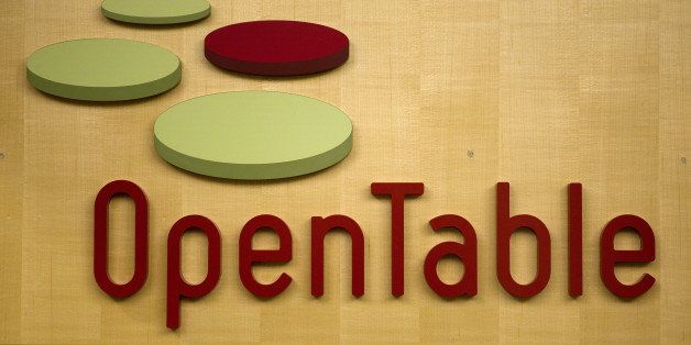 OpenTable Inc. signage is displayed at the company's headquarters in San Francisco, California, U.S., on Tuesday, Dec. 6, 2011. OpenTable Inc., the restaurant-reservation service that went public during the worst of the recession and saw its market value triple by the end of 2010, is reeling as investors lose their appetite for the stock. Photographer: David Paul Morris/Bloomberg via Getty Images