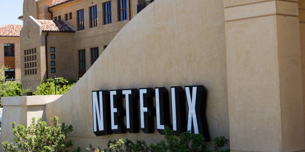 The Netflix Inc. logo is displayed at the entrance to the company's headquarters in Los Gatos, California, U.S., on Thursday, July 21, 2011. Neflix Inc. will be reporting their second quarter results on July 25 2011. Photographer: David Paul Morris/Bloomberg via Getty Images