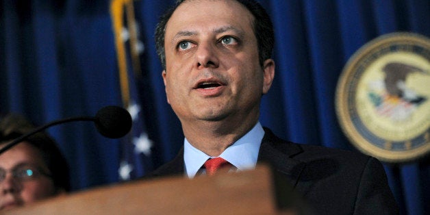 Preet Bharara, U.S. attorney for the Southern District of New York, announces charges against two former JPMorgan Chase & Co. traders during a news conference in New York, U.S., on Wednesday, Aug. 14 2013. Javier Martin-Artajo, a former executive who oversaw the trading strategy at the banks chief investment office in London, and Julien Grout, a trader who worked for him, were charged by U.S. prosecutors with attempting to conceal trading losses at the largest U.S. bank last year as part of a probe of its $6.2 billion loss on derivatives bets. Photographer: Peter Foley/Bloomberg via Getty Images