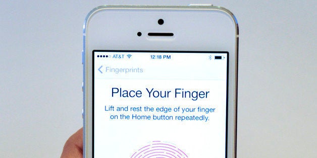 The new Apple Inc. iPhone 5S is displayed for a photograph during a product announcement in Cupertino, California, U.S., on T