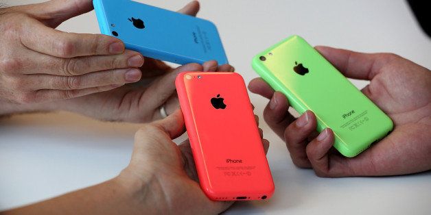 CUPERTINO, CA - SEPTEMBER 10: The new iPhone 5C is displayed during an Apple product announcement at the Apple campus on September 10, 2013 in Cupertino, California. The company launched the new iPhone 5C model that will run iOS 7 is made from hard-coated polycarbonate and comes in various colors and the iPhone 5S that features fingerprint recognition security. (Photo by Justin Sullivan/Getty Images)