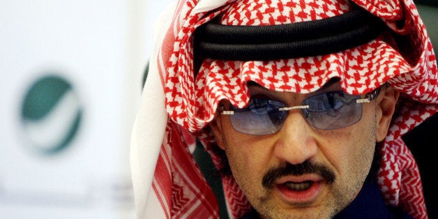 (FILES) -- File picture dated February 23, 2010 shows Saudi tycoon Prince AlWaleed bin Talal speaking during a press conference in Riyadh. The recent partnership between US media tycoon Rupert Murdoch, a pro-Israel diehard, and AlWaleed, a member of ultra-Islamic Saudi Arabia's monarchy, has provoked the anger of Egypt's cultural community, which fears that a part of Arab cultural heritage and Egypt may fall into the hands of Israel. In a deal announced on February 23, 2010 the two multi-billionaires have put aside stark political differences for the lucrative business of movies and television, with Alwaleed announcing in Riyadh that his Middle East regional entertainment giant Rotana Group was selling a nine percent stake to Murdoch's global media empire News Corp. AFP PHOTO/STR (Photo credit should read -/AFP/Getty Images)