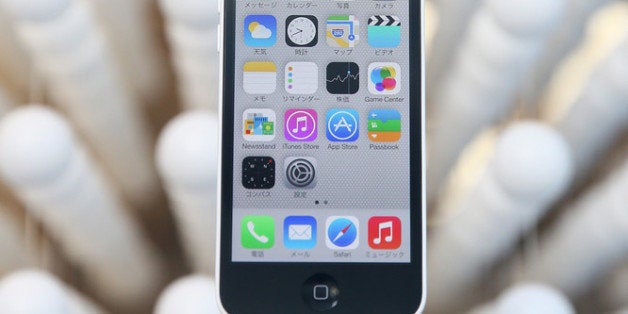 TOKYO, JAPAN - SEPTEMBER 20: An Apple Inc. iPhone 5S sits on display at Apple Store in Ginza district on September 20, 2013