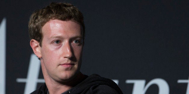 Mark Zuckerberg, founder and chief executive officer of Facebook Inc., listens to an audience member's question during an interview at the Newseum in Washington, D.C., U.S., on Wednesday, Sept. 18, 2013. Zuckerberg said helping 11 million undocumented U.S. residents is the most important aspect of immigration issues he's exploring with congressional leaders during a Washington visit. Photographer: Andrew Harrer/Bloomberg via Getty Images 