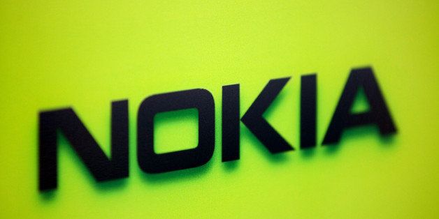 A logo sits on display inside a Nokia Oyj store in Helsinki, Finland, on Wednesday, July 17, 2013. Nokia Oyj plans to start selling a Lumia smartphone with a high-resolution camera, the Finnish handset maker's latest effort to revive its comeback bid. Photographer: Henrik Kettunen/Bloomberg via Getty Images