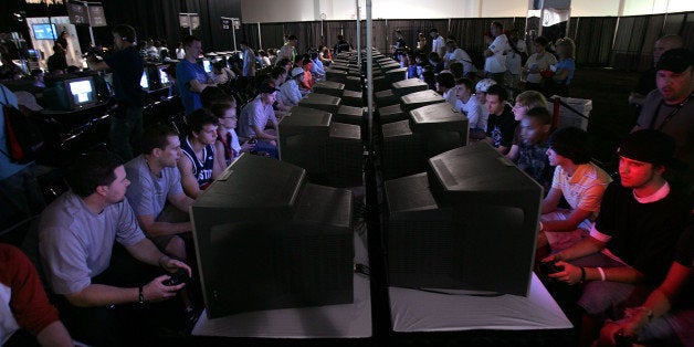 EAST RUTHERFORD, NJ - JUNE 08: Competitors play video games on monitors during the Major League Gaming Pro Circuit event Jun