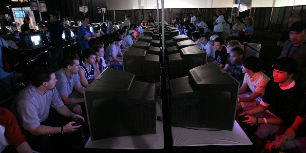 EAST RUTHERFORD, NJ - JUNE 08: Competitors play video games on monitors during the Major League Gaming Pro Circuit event June 8, 2007 at the Meadowlands Expo Center in East Rutherford, New Jersey. Over 2,500 pro and amateur gamers from across North America have converged onto the Meadowlands Expo Center to compete in the games Halo 2, Rainbow Six Vegas, and Gears of War. The gamers will compete over three days for up to $20,000 in prizes. (Photo by Spencer Platt/Getty Images)