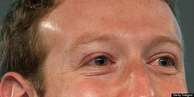 Mark Zuckerberg, chief executive officer and founder of Facebook Inc., smiles during an event at the company's headquarters in Menlo Park, California, U.S., on Thursday, March 7, 2013. Zuckerberg discussed the social-network site's upgraded News Feed which includes bigger photos, information sorted into topics and a more consistent design across devices. Photographer: David Paul Morris/Bloomberg via Getty Images