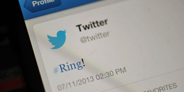LONDON, ENGLAND - NOVEMBER 07: In this photo illustration, the Twitter logo and hashtag '#Ring!' is displayed on a mobile device as the company announced its initial public offering and debut on the New York Stock Exchange on November 7, 2013 in London, England. Twitter went public on the NYSE opening at USD 26 per share, valuing the company's worth at an estimated USD 18 billion. (Photo by Bethany Clarke/Getty Images)
