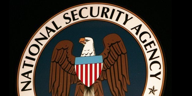 Fort Meade, UNITED STATES: (FILES): Thyis 25 January 2006 file photo shows the logo of the National Security Agency (NSA) at the Threat Operations Center inside the NSA in the Washington suburb of Fort Meade, Maryland, where US President George W. Bush delivered a speech behind closed doors and met with employees in advance of Senate hearings on the much-criticized domestic surveillance. The US National Security Agency has assembled the world's largest database of telephone records tracking the phone calls of tens of millions of AT and T, Verizon and BellSouth customers, sources familiar with the program told USA Today. In an article published 11 May 2006, the daily said the NSA launched the secret program in 2001, shortly after the 11 September 2001 attacks, to analyze calling patterns in a bid to detect terrorist activity. AFP PHOTO/FILES/Paul J. Richards (Photo credit should read PAUL J. RICHARDS/AFP/Getty Images)