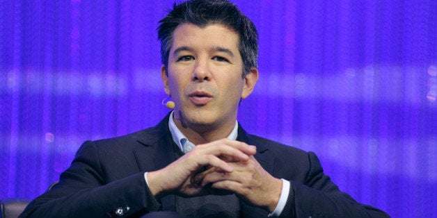 Travis Kalanick, Co-Founder and CEO of Uber, a mobile application connecting passengers with drivers of vehicles for hire, ta
