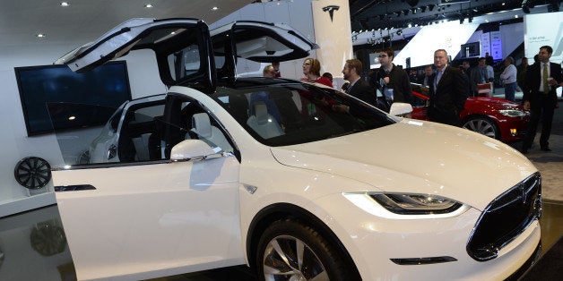 The Tesla Model X is introduced at the 2013 North American International Auto Show in Detroit, Michigan, January 15, 2013. AFP PHOTO/STAN HONDA (Photo credit should read STAN HONDA/AFP/Getty Images)