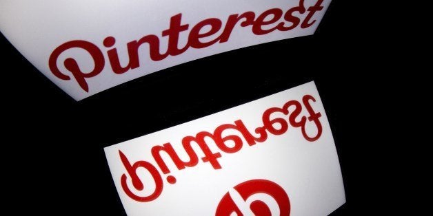 The logo of mobile app 'Pinterest' is displayed on a tablet on January 2, 2014 in Paris. AFP PHOTO / LIONEL BONAVENTURE (Photo credit should read LIONEL BONAVENTURE/AFP/Getty Images)