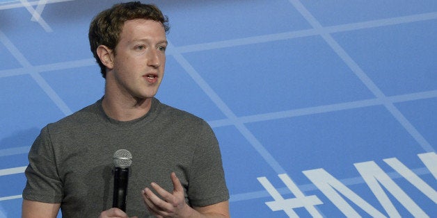 Facebook's 29-year-old billionaire creator Mark Zuckerberg speaks on the opening day of the Mobile World Congress in Barcelon