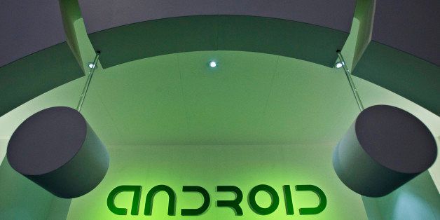A logo sits illuminated outside the Android operating system pavilion on day two of the Mobile World Congress in Barcelona, Spain, on Tuesday, Feb. 25, 2014. Top telecommunication managers will rub shoulders in Barcelona this week at the Mobile World Congress, Monday, Feb. 24 - 27, a traditional venue for showcasing the latest products for dealmaking. Photographer: Angel Navarette/Bloomberg via Getty Images