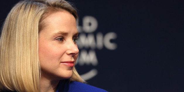 Marissa Mayer, chief executive officer of Yahoo! Inc., pauses during a session on the opening day of the World Economic Forum (WEF) in Davos, Switzerland, on Wednesday, Jan. 22, 2014. World leaders, influential executives, bankers and policy makers attend the 44th annual meeting of the World Economic Forum in Davos, the five day event runs from Jan. 22-25. Photographer: Chris Ratcliffe/Bloomberg via Getty Images 