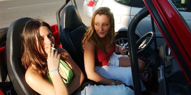 ROME - JUNE 10: Violante Pasolini, 17, (R) and Ludovica Lombardini, 17, (L) sit in Violante's small car as they go to the bea