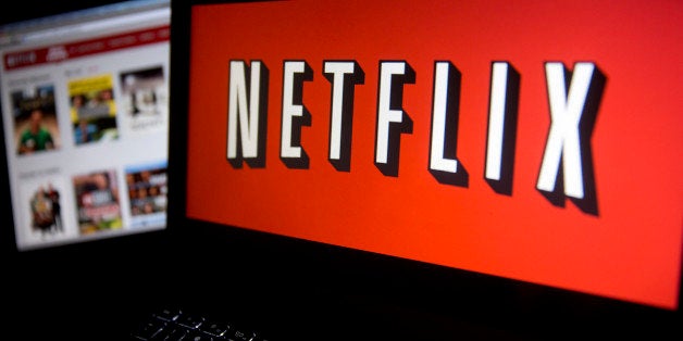 The Netflix Inc. website and logo are displayed on laptop computers arranged for a photograph in Washington, D.C., U.S., on T