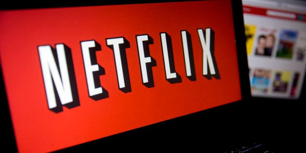 The Netflix Inc. website and logo are displayed on laptop computers arranged for a photograph in Washington, D.C., U.S., on T