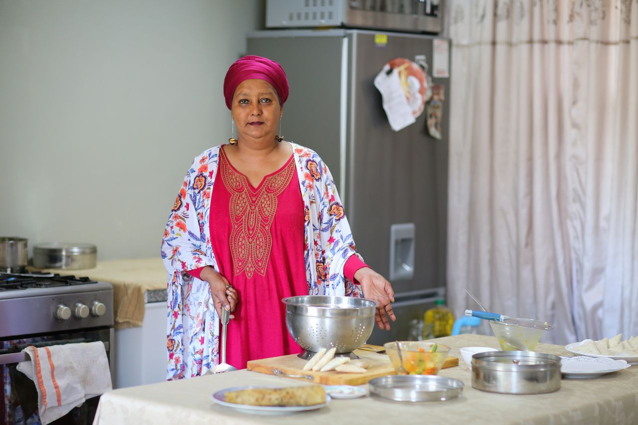 Faldela Tolker cooks in her kitchen in Bo-Kaap. 