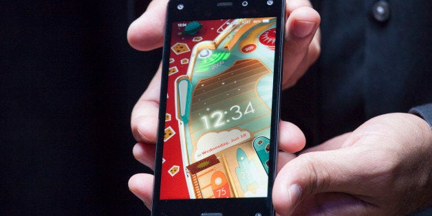 SEATTLE, WA - JUNE 18: Amazon.com's first smartphone, the Fire Phone, is displayed during a demonstration at the company's Fire Phone launch event on June 18, 2014 in Seattle, Washington. The much-anticipated device is available for pre-order today and is available exclusively with AT&T service. (Photo by David Ryder/Getty Images)