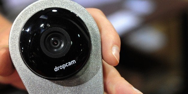 The dropcam HD Wi-Fi Video Monitoring Camera which uses cutting-edge data analysis and motion/audio sensing is displayed on t